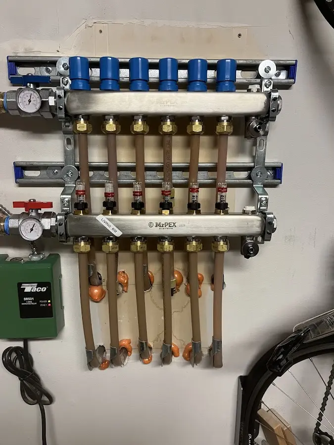 Plumber performing Leak Detection at a residential property in Sennett